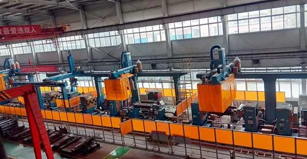 乐鱼|国内首条煤机中部槽机器人自动生产线成功交付啦